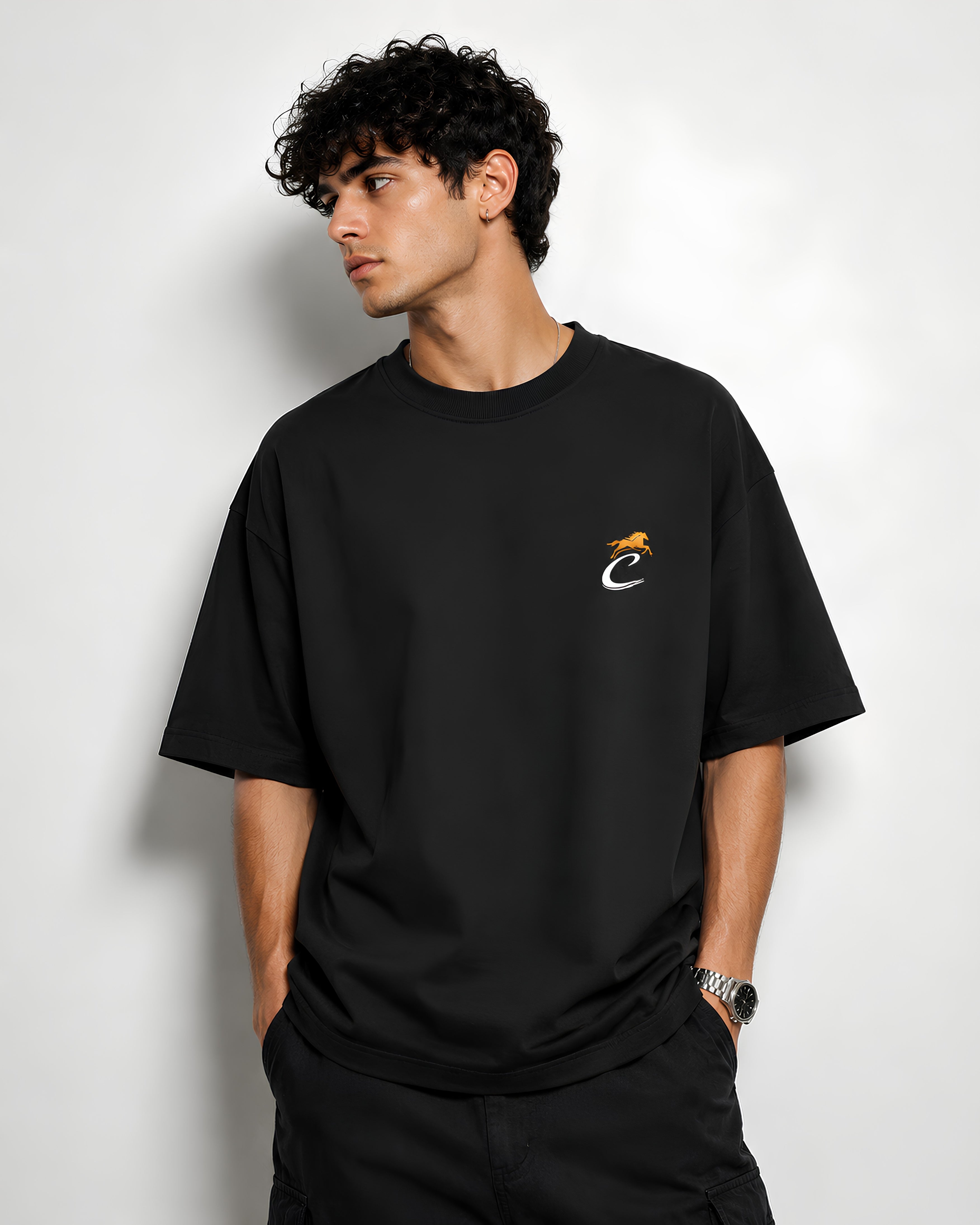 Front Model: CHIMYA The Lone Wolf oversized black t shirt front view on male model premium streetwear