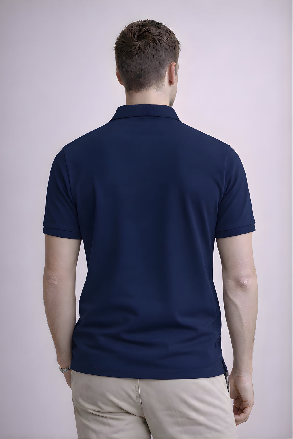 Back view of men’s navy blue polo t-shirt with premium cotton fabric and slim fit design